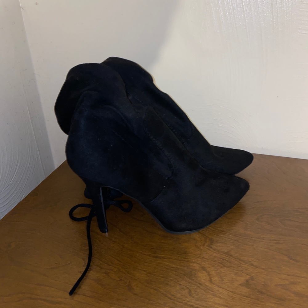 Black heeled over the knee boots
